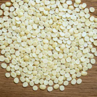 top angle shot of guar splits layed out on a wooden table.